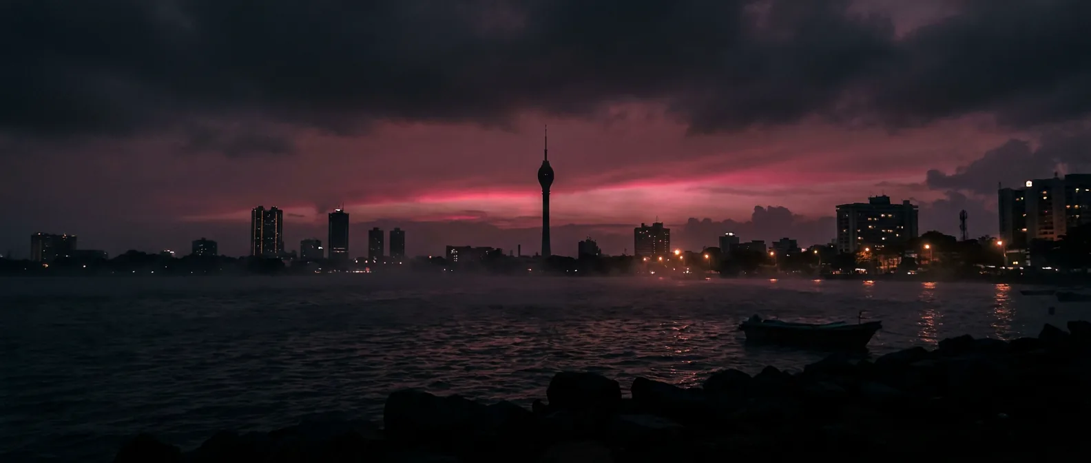 Colombo skyline at dusk under a burgundy sky